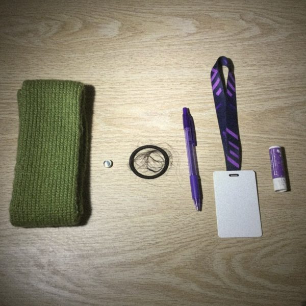 Small personal items laid out on a table
